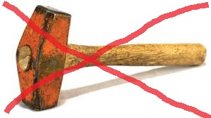 A hammer with an x drawn over it